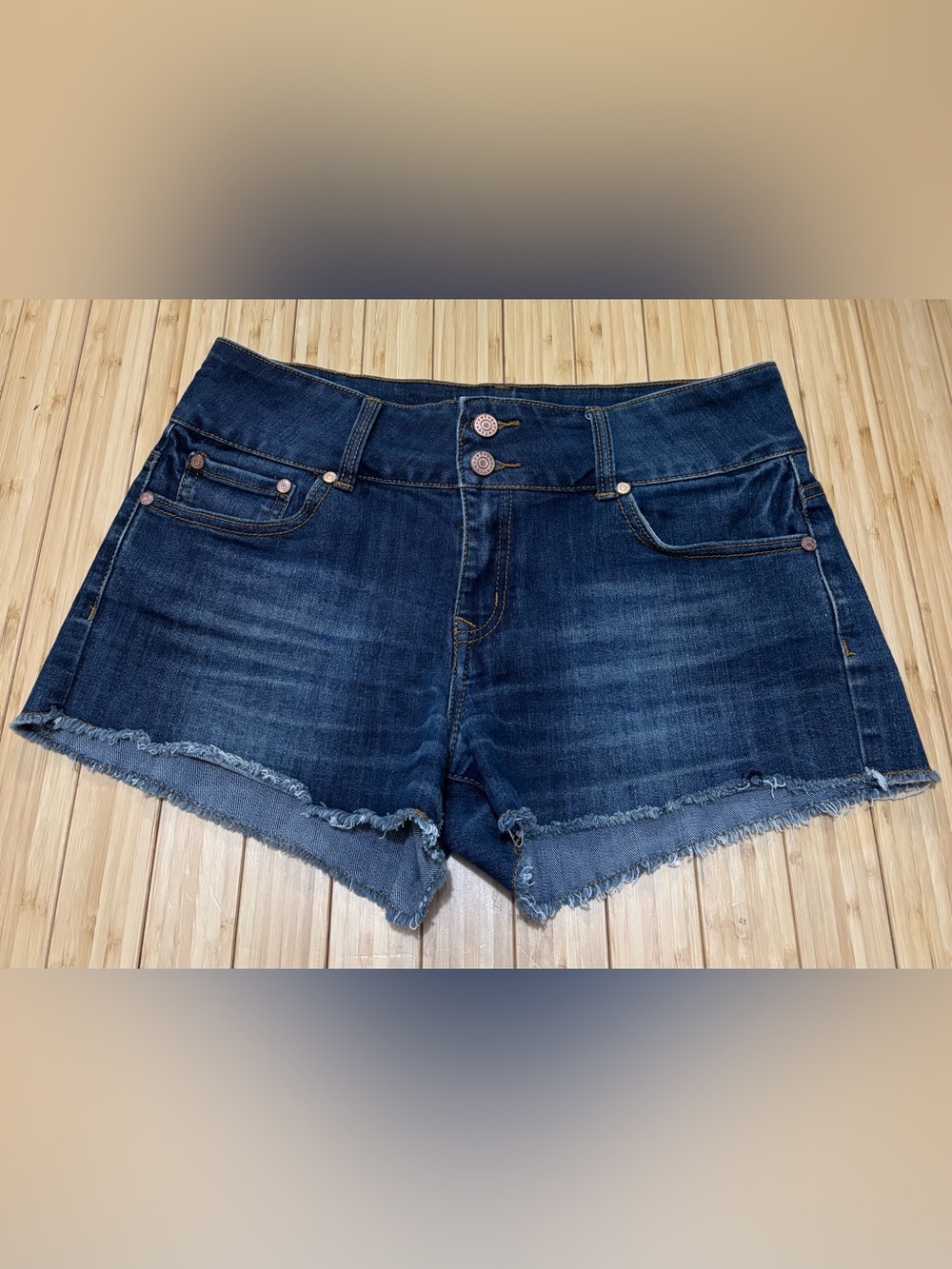 Refuge high-waisted denim shorts in a dark wash finish.  Size 8. EUC.